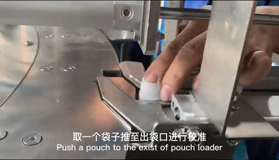 the sync rate of the pouch pusher pushing the pouch into the turntable of stand up pouch packaging equipment